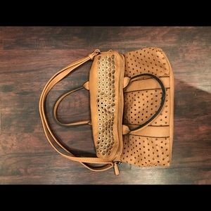 Tan handbag with fun detailing!